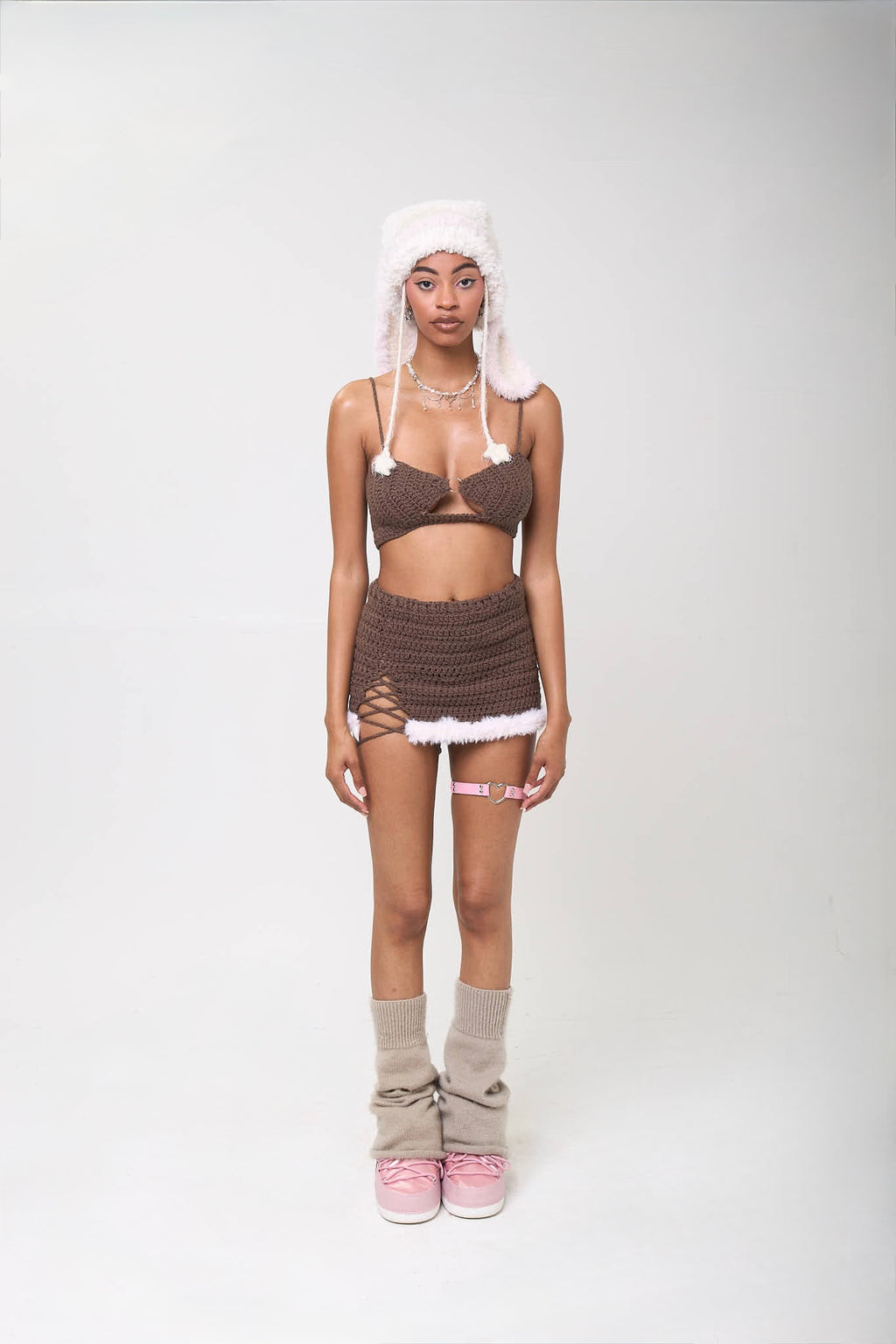 Full body view of model wearing the Brat top on a white background