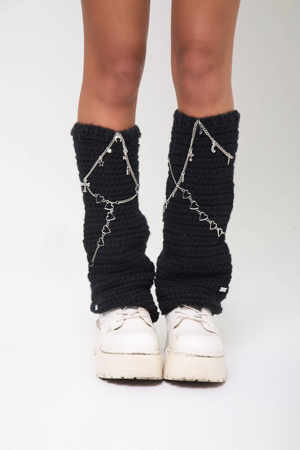 Back view of the Not My First Rodeo leg warmers worn with sneakers