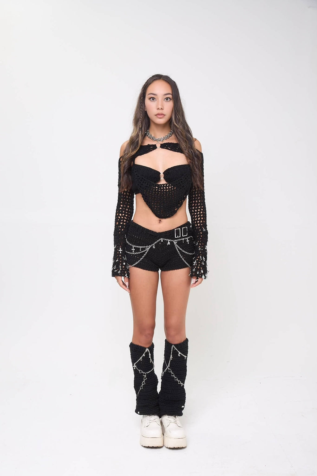 Model wearing the Not My First Rodeo shorts styled with a matching outfit on a white background