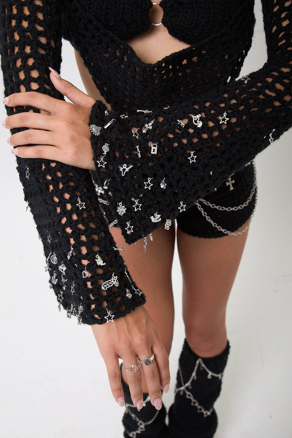 Close-up view of the Not My First Rodeo sleeves showing fit and crochet texture