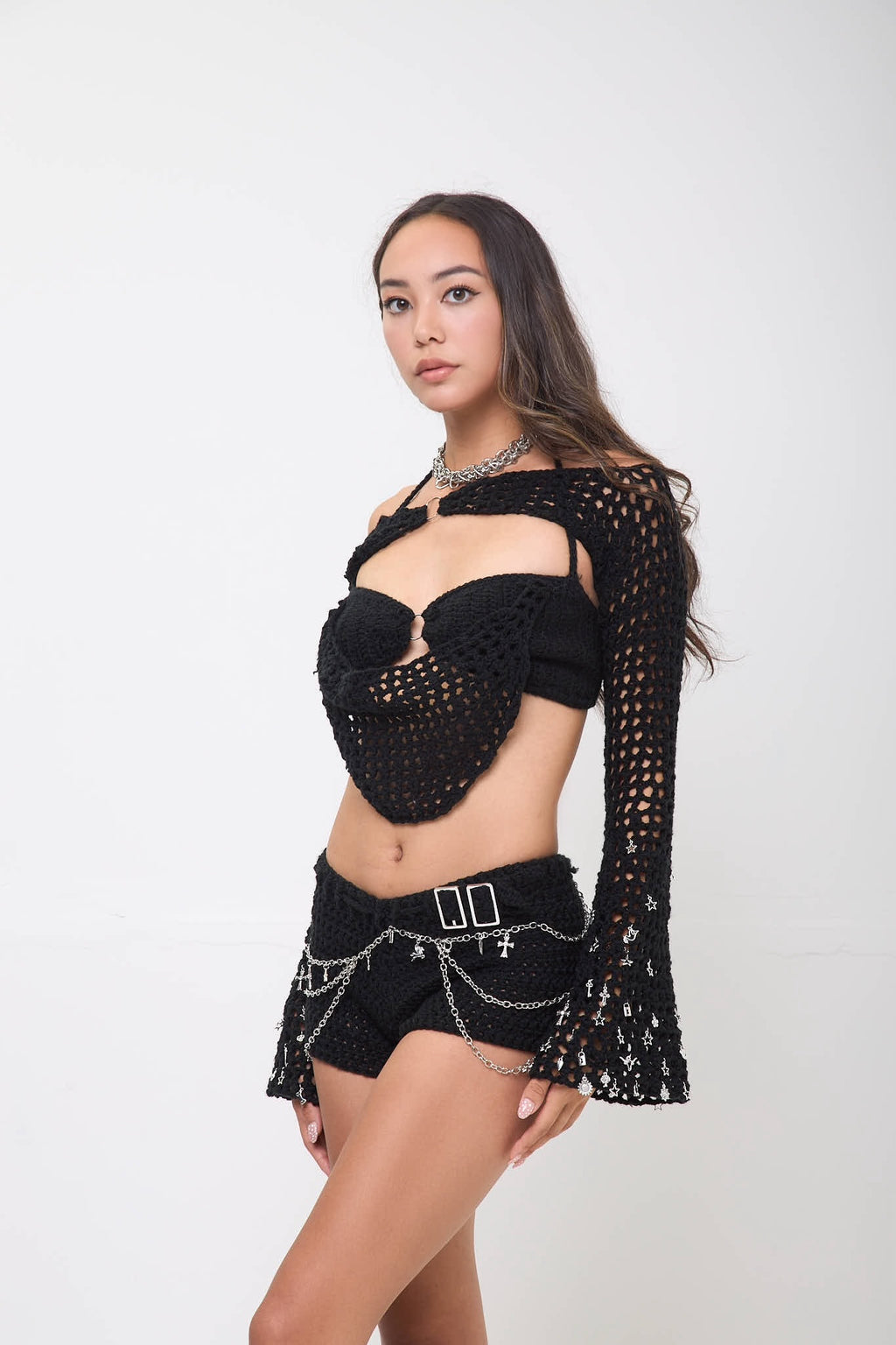 Model wearing the Not My First Rodeo sleeves styled with a matching outfit on a white background