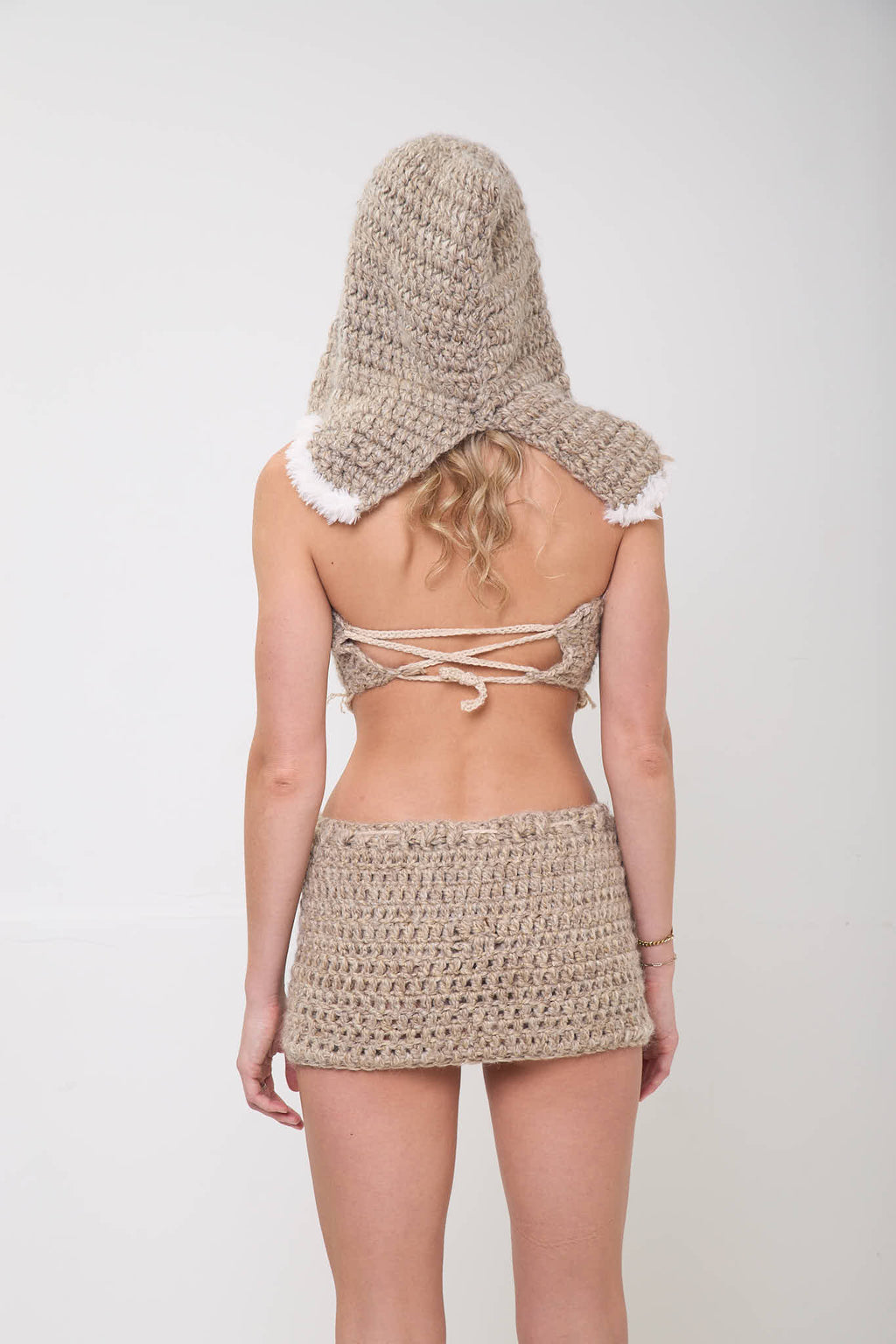 Back view of handmade crochet sand storm top