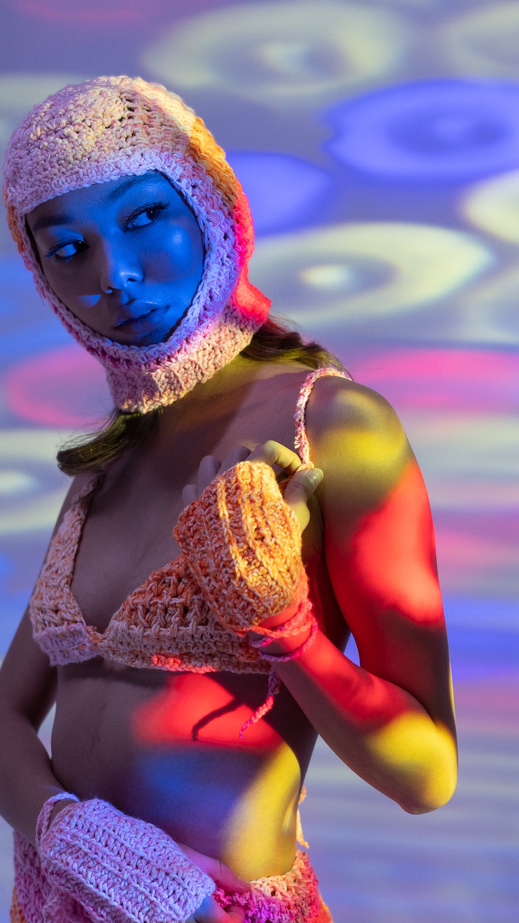 Side view of sunset ombré crochet balaclava