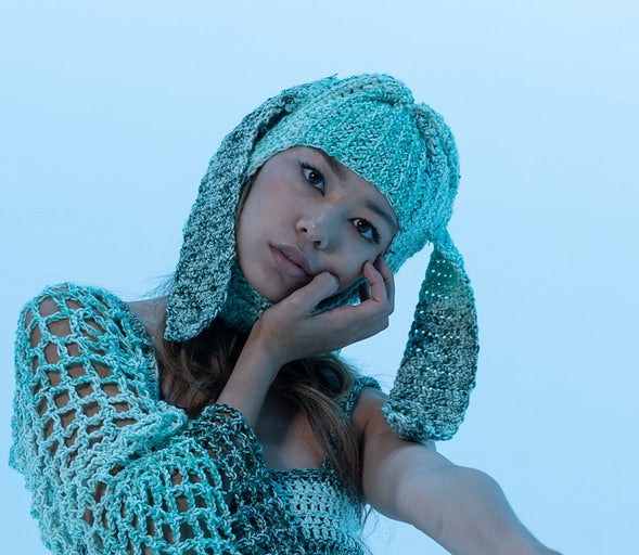 Close up of blue ombré crochet balaclava with bunny ears